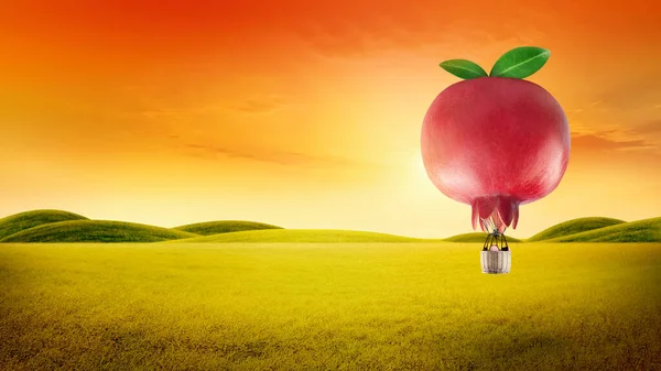 Pomegranate fruit shaped hot air balloon, Hot air balloon floating over a green hill Elements of nature and sky background, Tourism and travel concept