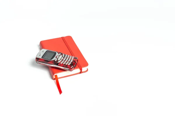 Red Mobile Phone Red Notepad White Background Planning Calling — Foto de Stock