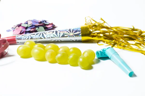 Twelve grapes and utensils for New Year's holiday — Stock Photo, Image