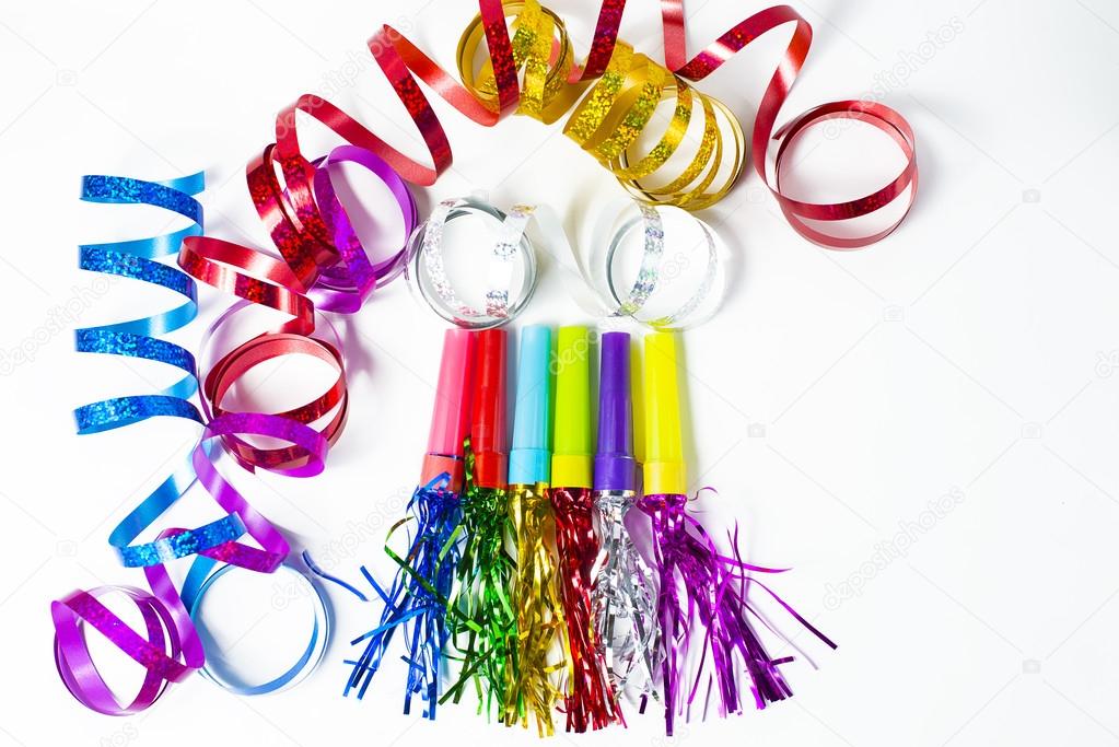 Party Horn Blower with colored streamers on white background