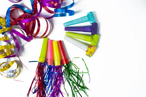Party items, blowers and colorful streamer — Stock Photo, Image