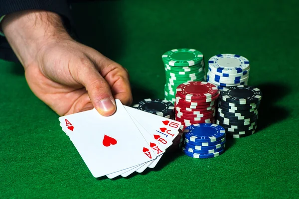 Flush in poker and betting chips — Stock Photo, Image