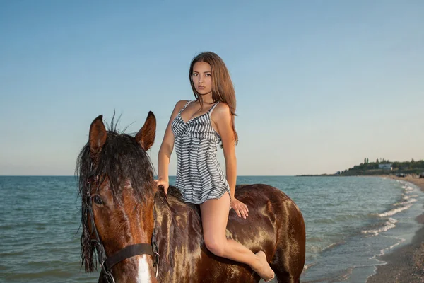 Woman on horse — Stock Photo, Image