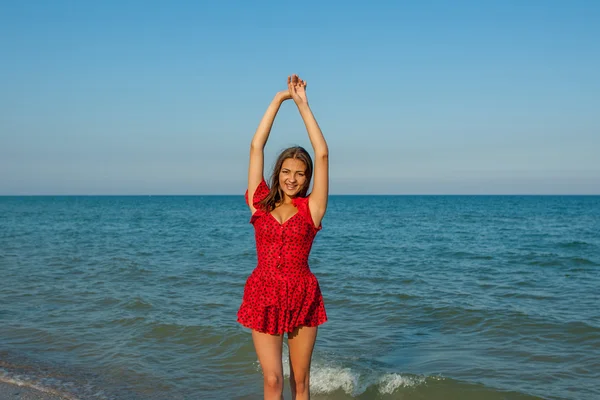 Young happiness woman on the sea — Stock Photo, Image