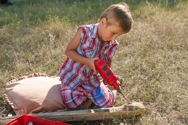 Little boy hard at work — Stock Photo, Image