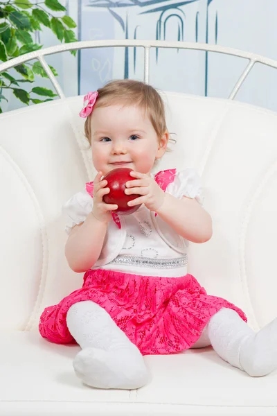 Little baby girl with apple — Stock Photo, Image