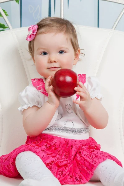 Little baby girl with apple — Stock Photo, Image