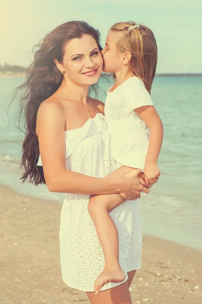 Mother and her little daughter hugging. — Stock Photo, Image