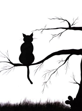 Kedi ağaçta oturuyor.