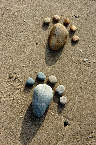 Foot, pebble, sand, art, beach — Stock Photo, Image