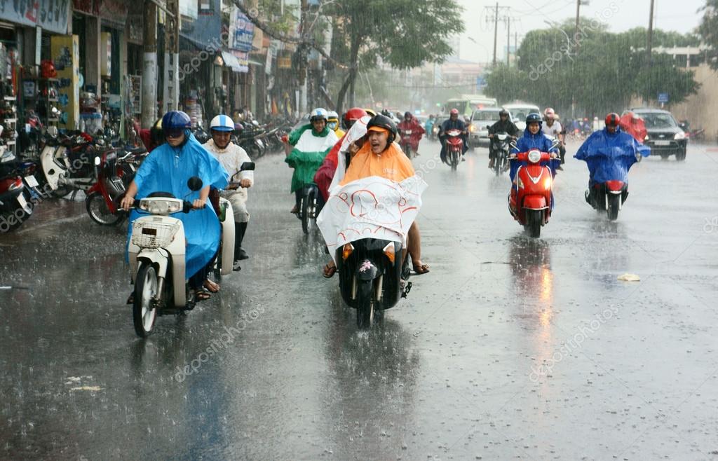 Riding through the rain gets treacherous, especially around Thao Dien where streets get flooded rapidly. 