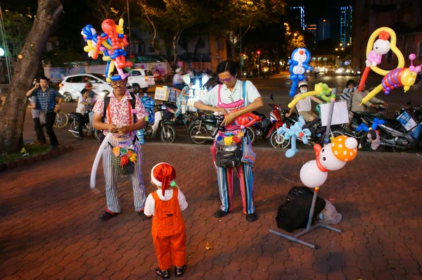 Ásia artista de rua, banda desenhada balão — Fotografia de Stock