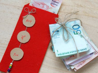 Vietnam Tet, kırmızı zarf, şanslı para