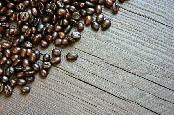 Coffee bean background, wooden texture — Stock Photo, Image