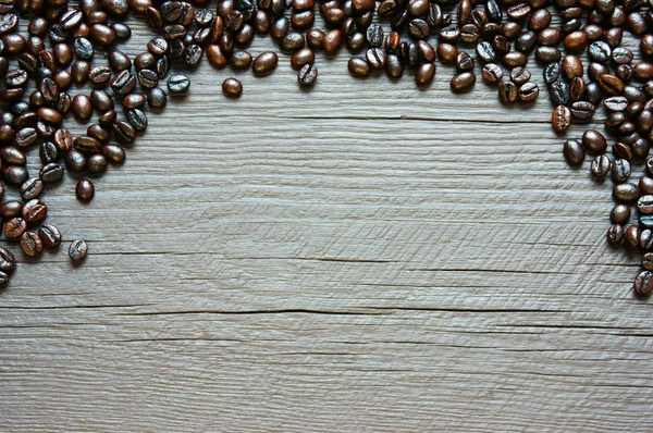 Fondo chicco di caffè, texture in legno — Foto Stock