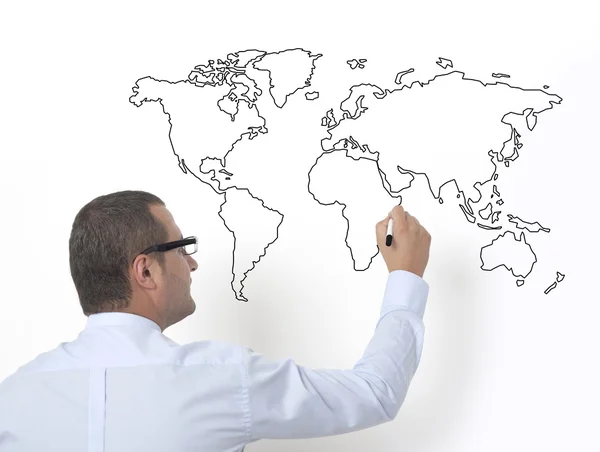 Teacher drawing the world map Stock Picture