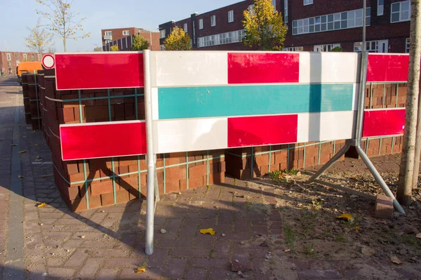 Barriers for roadworks in a street in a residential area in Arnhem, Netherlands — Stock Image Barriers Roadworks Street Residential Area Arnhem Netherlands Royalty Free Stock Photos