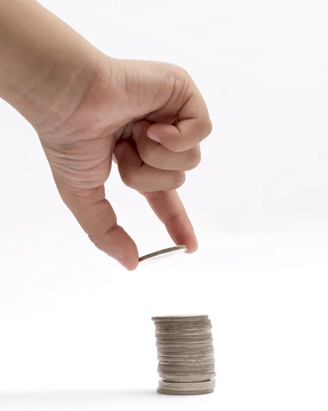 Mano recogiendo algunas monedas — Foto de Stock