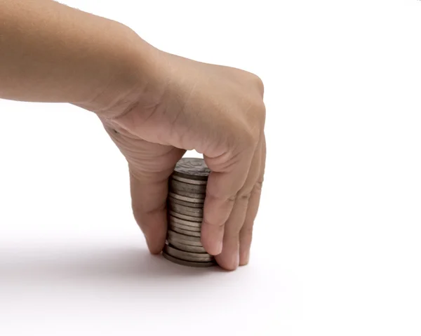 Hand picking up some coins — Stock Photo, Image