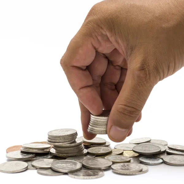 Hand picking up some coins — Stock Photo, Image