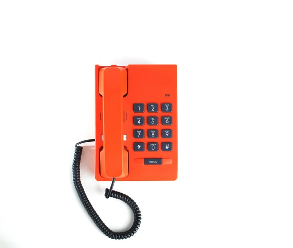 Laranja colorido telefone vintage com teclado do telefone — Fotografia de Stock