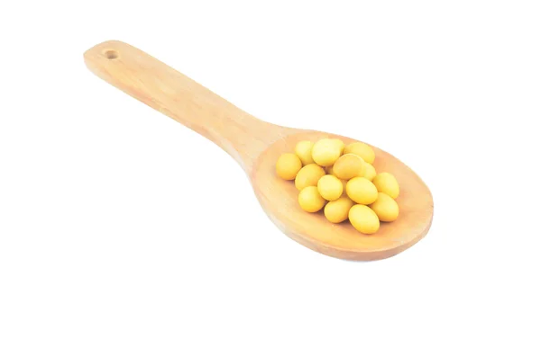 Snack nuts in a wooden spoon — Stock Photo, Image