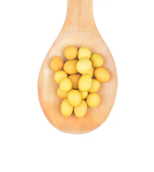 Snack nuts in a wooden spoon — Stock Photo, Image