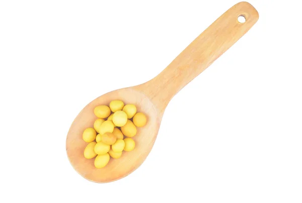 Snack nuts in a wooden spoon — Stock Photo, Image