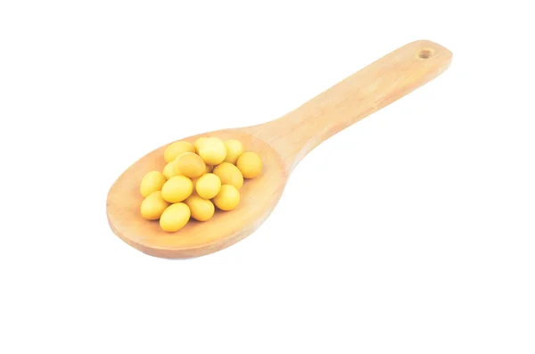 Snack nuts in a wooden spoon — Stock Photo, Image