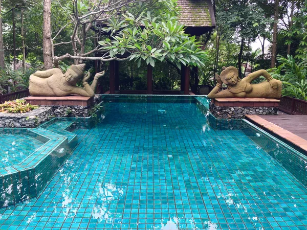 The pool with the stone statues in Chiang mai,Thailand