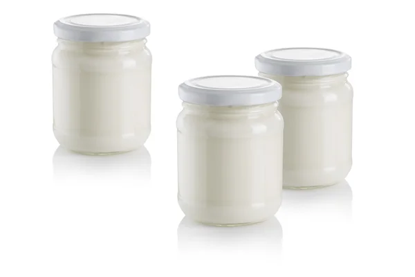Glass jars of yoghurt — Stock Photo, Image