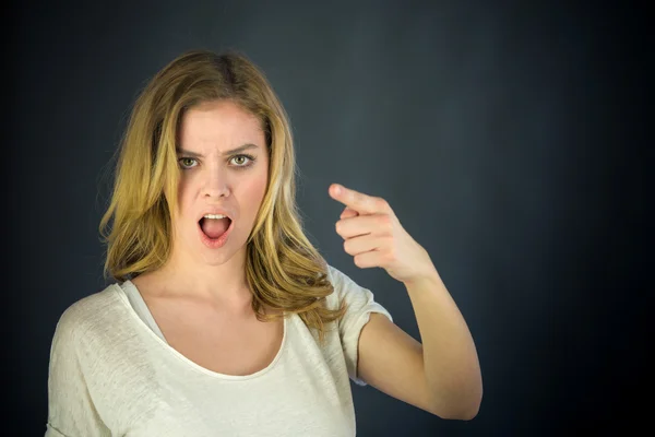 Woman scolding with finger — Stock Photo, Image