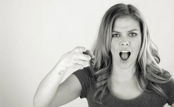 Vrouw scolding met vinger — Stockfoto