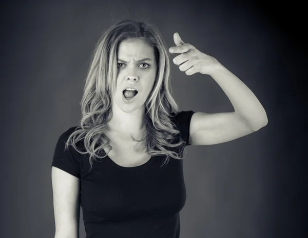 Woman scolding with finger — Stock Photo, Image