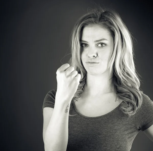 Woman showing her fist — Stock Photo, Image