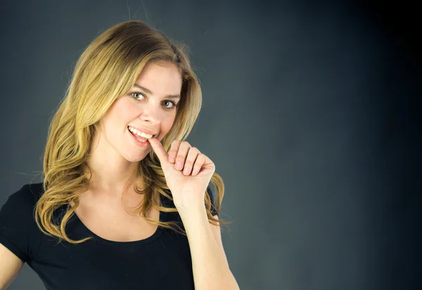 Nervous woman biting finger nails — Stock Photo, Image