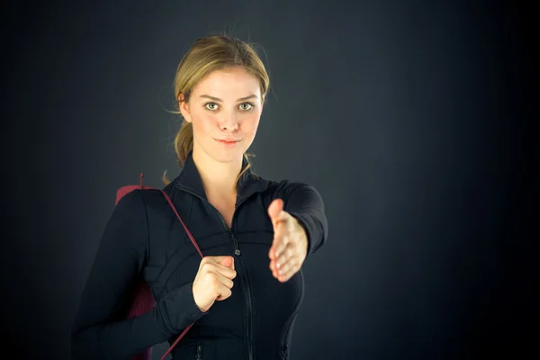 Woman greetings with handshake — Stock Photo, Image