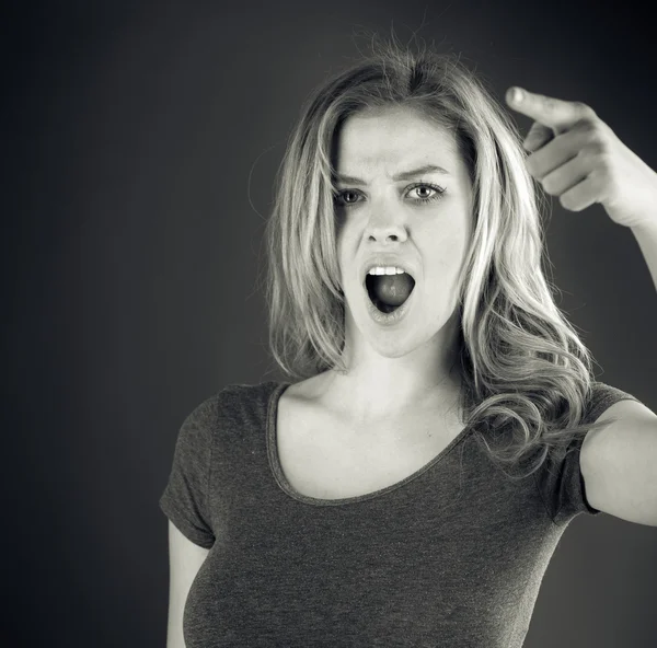 Woman scolding with finger — Stock Photo, Image