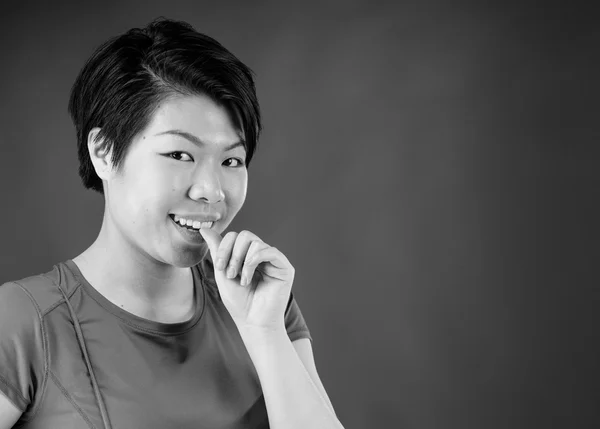 Nervous woman biting finger nails — Stock Photo, Image