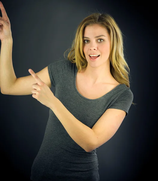 Woman pointing to camera with fingers — Stock Photo, Image