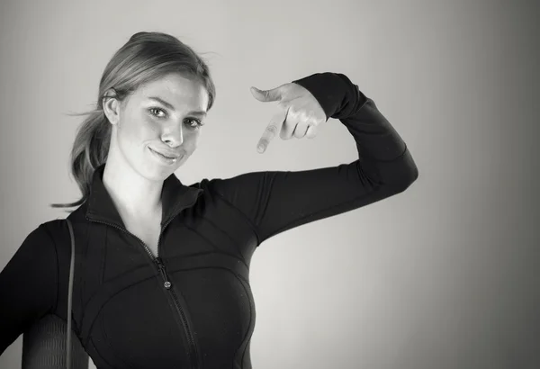 Woman pointing to herself — Stock Photo, Image