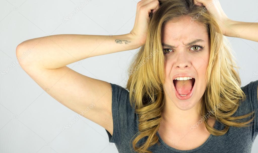 Stressed Model pulling hairs Stock Photo by ©Bruno135 111380406