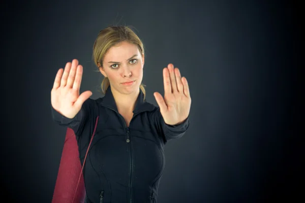 Woman gesturing stop sign with hands — Stock Photo, Image