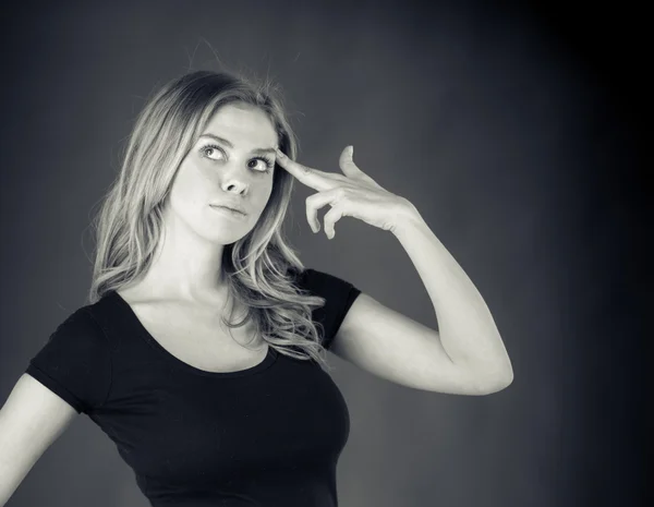 Woman in despair with hand gun — Stock Photo, Image