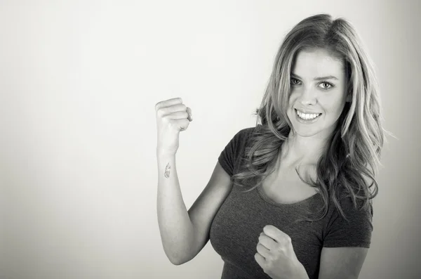 Woman celebrating success with fists up — Stock Photo, Image