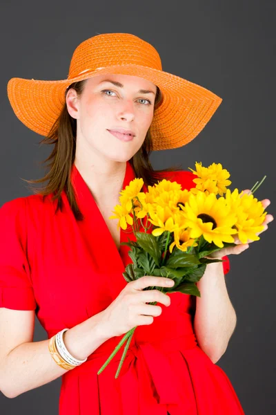 Model smelling flowers — Stock Photo, Image