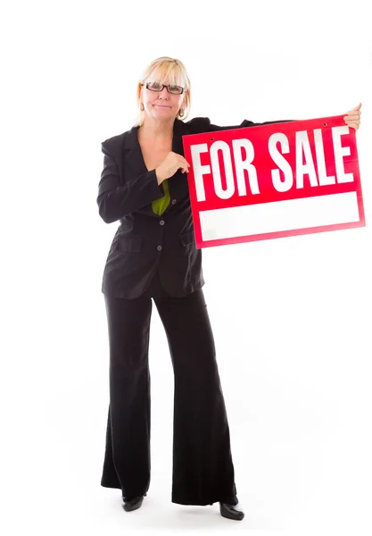 Model holding a For sale sign — Stock Photo, Image