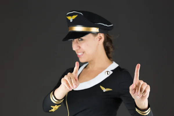 Air hostess scolding with finger — Stock Photo, Image