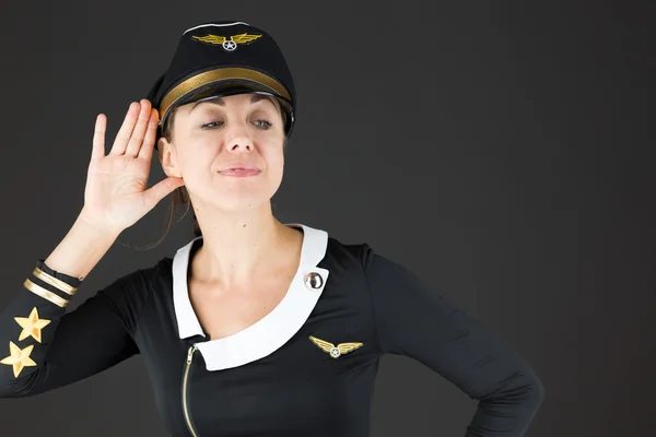 Stewardess hört zu — Stockfoto