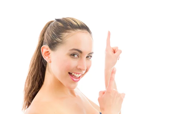 Model looking at camera and pointing — Stock Photo, Image